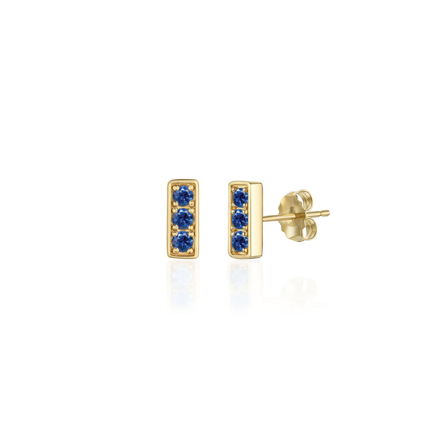 Pair of earrings that are shaped like little rectangles with three round blue sapphires set into each. The earrings are positioned vertically. The blue sapphires are set into 14k yellow gold.