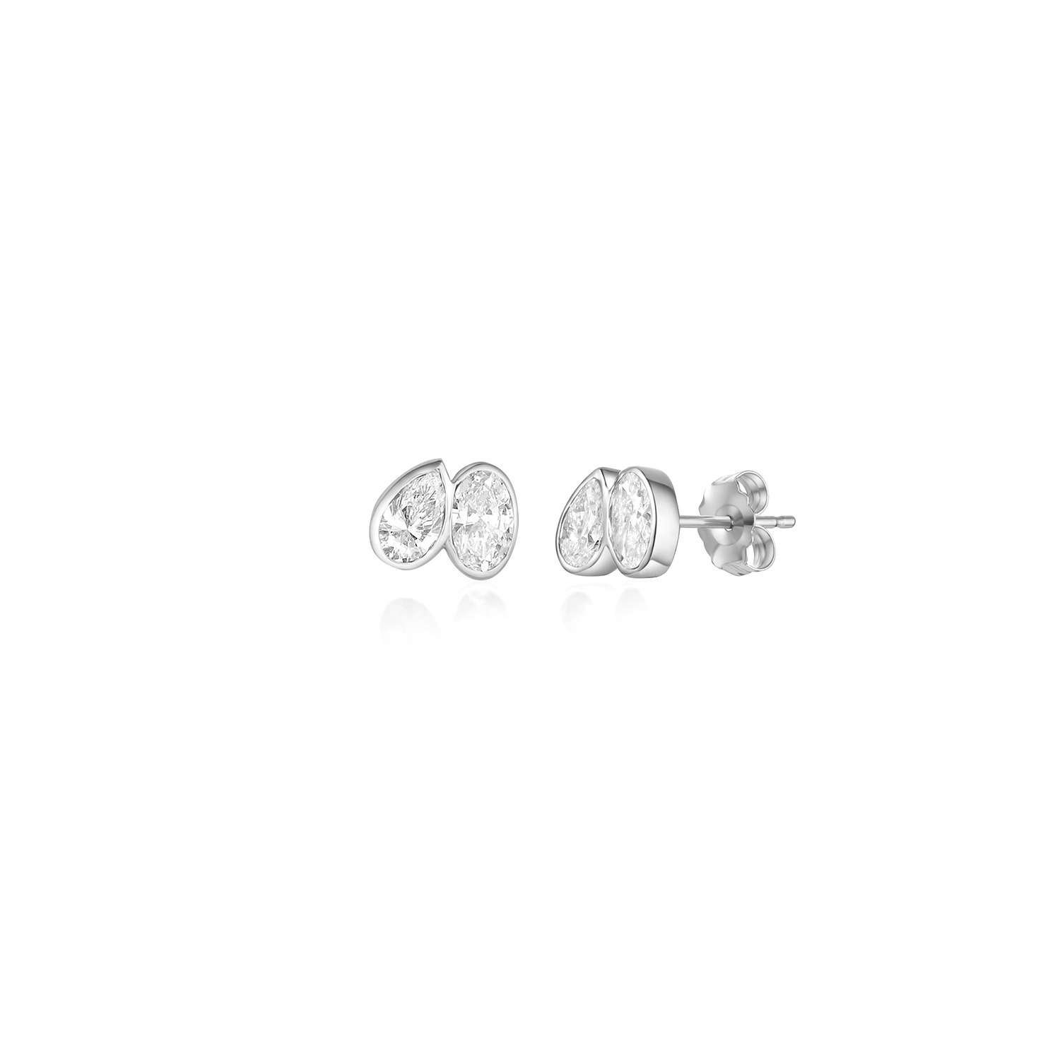 A pair of toi et moi style studs with a pear diamond tilted towards an oval diamond. Bezel set in 14k white gold.